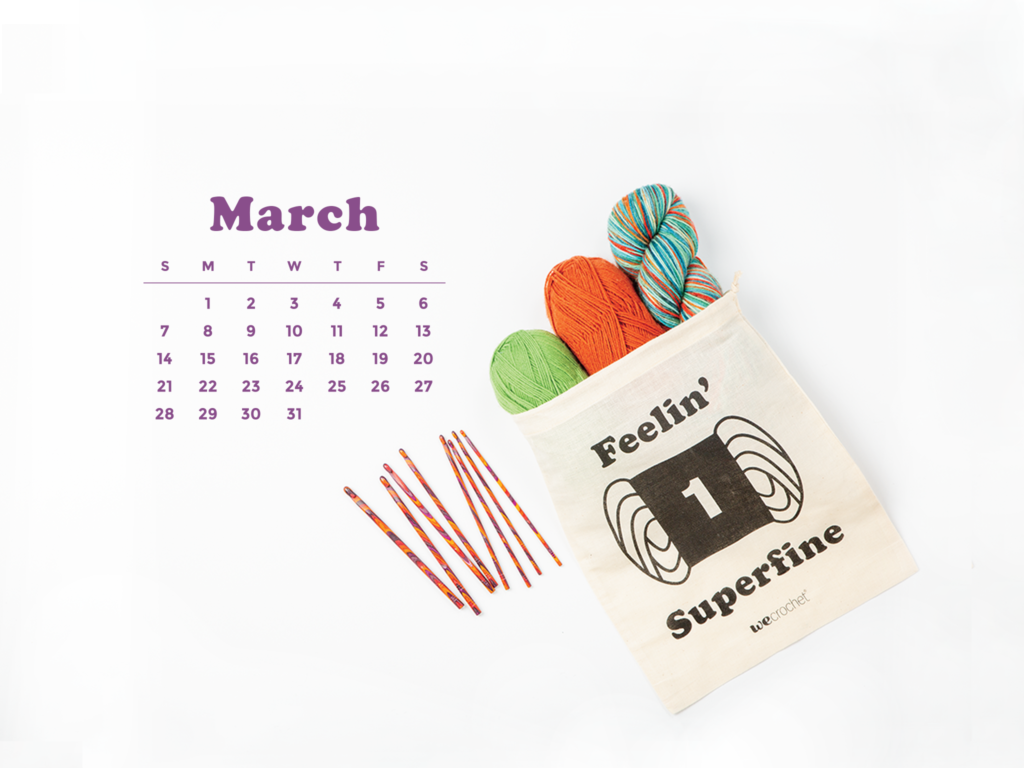 A white background with the March 2021 calendar. A cream-colored project bag that says "Feelin' Superfine" with a yarn weight 1 icon, filled with colorful yarn. A set of colorful orange/purple Radiant wooden crochet hooks is next to the bag.