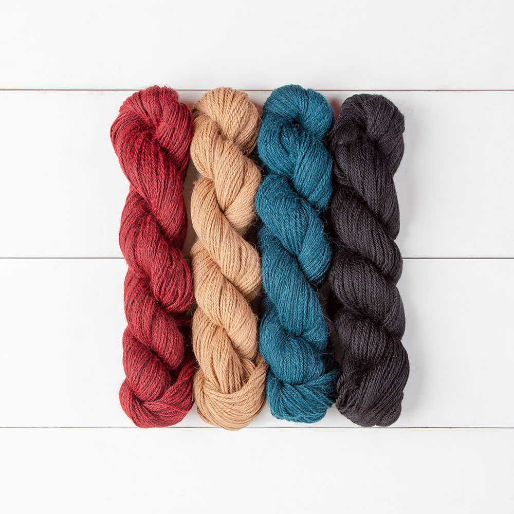 Four hanks of Alpaca Cloud Fingering Yarn